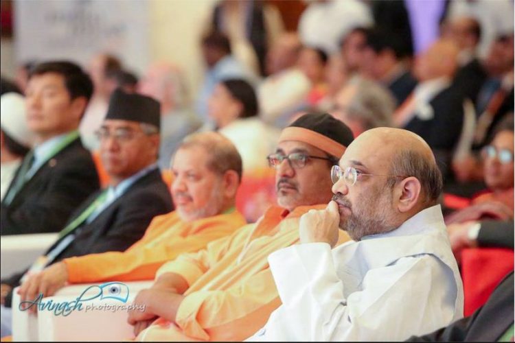 Deuba seated beside a man who looks like Lobsang Sangay. Photo: India Ideas Conclave